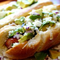Three-Cheese-Mexican-Style-Sausage-Dogs-with-Avocado-Featured